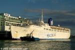ID 1732 THE TOPAZ (1956/32327grt/IMO 5103924, ex-OLYMPIC, CARNIVALE, FIESTAMARINA, QUEEN ANNA MARIA, EMPRESS OF BRITAIN) comes alongside the Princes Wharf passenger terminal and Hilton Hotel in Auckland, New...